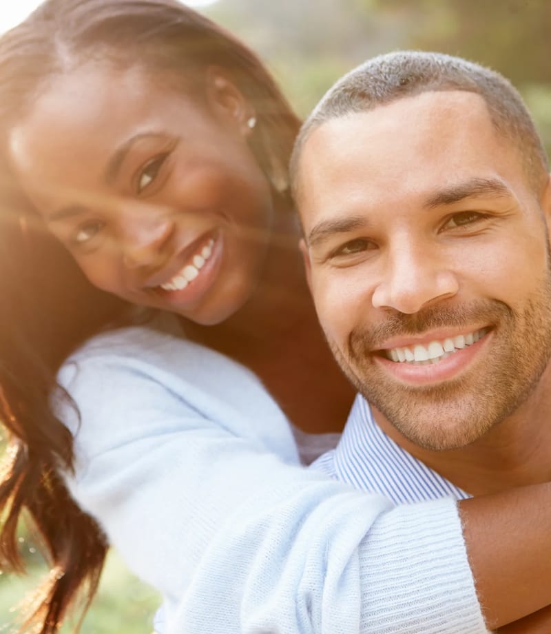 A happy couple with bright smiles